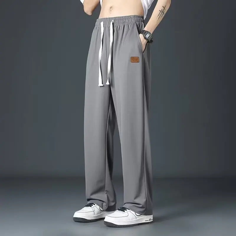 Casual long pants for boys, ice silk quick drying pants for spring and summer, thin, trendy brand straight tube, loose, hanging